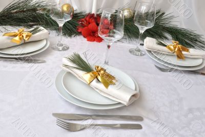 Coordinated decorative napkin on a plate with cutlery
