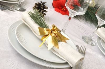 Coordinated decorative napkin on a plate with cutlery