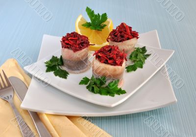 Rolls of herring with beetroot, apple stuffing