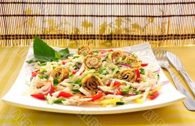 Scrambled eggs with green onions, fresh vegetables and sesame se