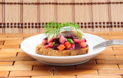 Sandwiches with rye bread, herring and vegetables