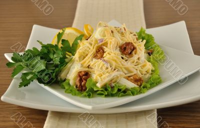 Salad with cheese and apple, walnuts and yogurt