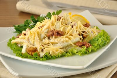 Salad with cheese and apple, walnuts and yogurt