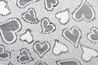 white lace patterned with hearts