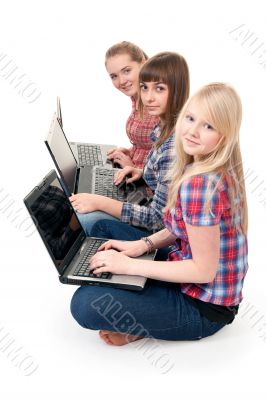 Three girls with laptops