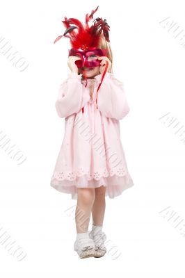 little girl in a red mask in studio