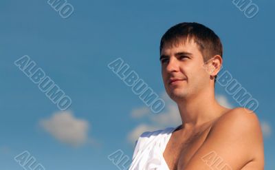 Portrait of a man against the sky