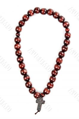 wooden beads with a cross isolated
