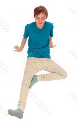 Teen sits on the floor