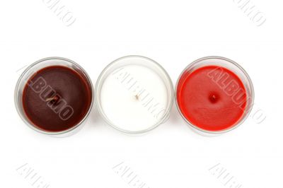 Three glass candlesticks