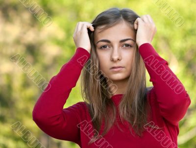 beautiful girl in a red jacket