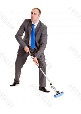 Businessman with a mop