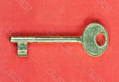 old golden key to the door