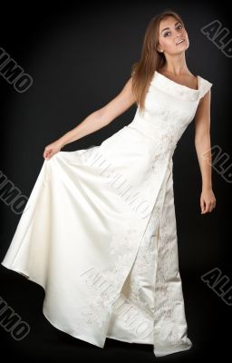 beautiful young girl in a cream gown