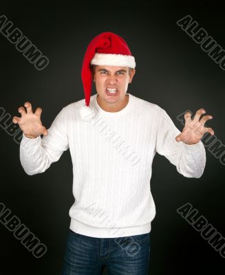 man in the bell Santa`s face shows terrible