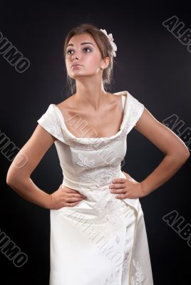 girl in a wedding dress in the studio