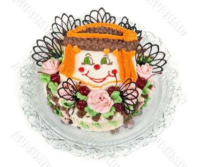 delicious cake with a pattern in the form of little faces clown