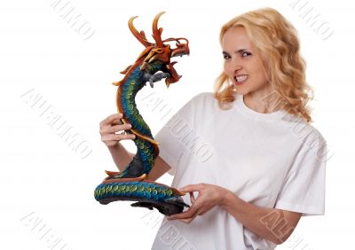 beautiful girl with a wooden dragon