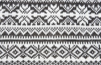 gray background with a knitted pattern