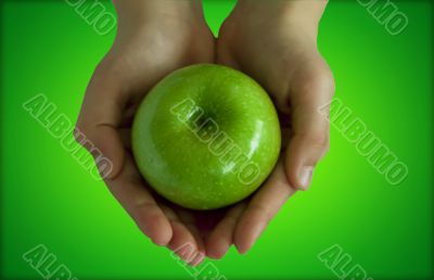 Green apple is in my hand
