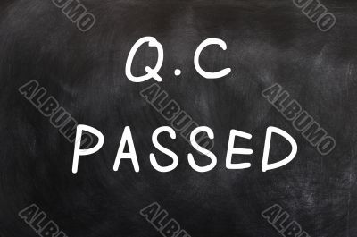 QC passed written on a chalkboard 