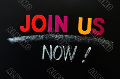 Join us now- text on a blackboard