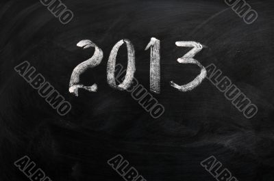 Year 2013 written on a blackboard