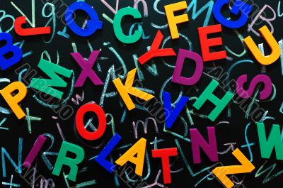 Colorful random letters on a blackboard