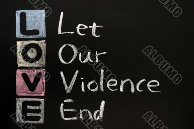 LOVE acronym, on a blackboard with words written in chalk