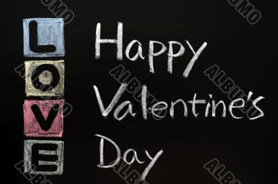 Love drawn in chalk on a chalkboard 