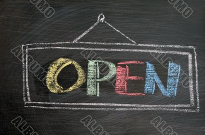 Open - word written on blackboard