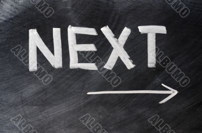 Next written on blackboard