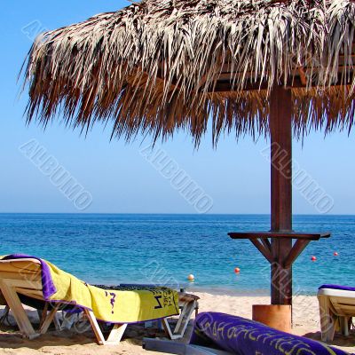 Sunchairs and umbrellas on Beach