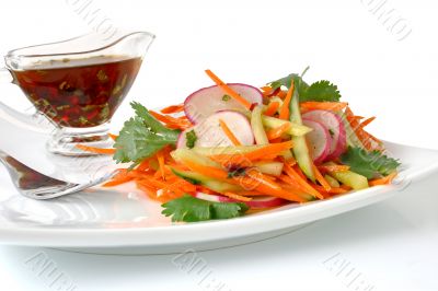 Salad with carrot, cucumber and radish