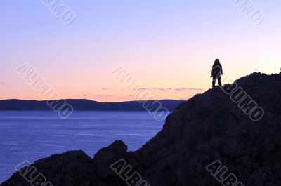 Landscape in Tibet with a photographer`s silhouette