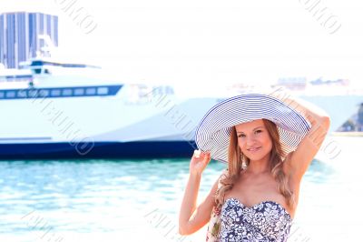 The girl on the background of the ocean liner