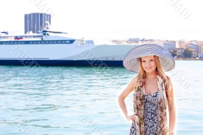 The girl on the background of the ocean liner