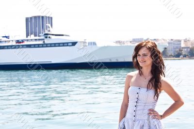 The girl on the background of the ocean liner