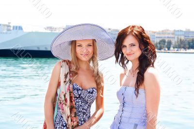 Two girls in the background of the ocean liner