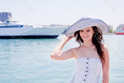 The girl on the background of the ocean liner