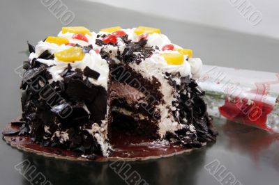 Chocolate cake with fruit toppings