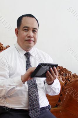 Business man with tablet computer