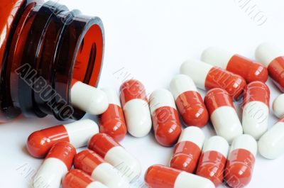 Red-and-white capsules