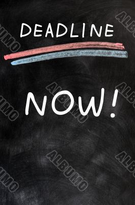 Deadline Now written on a blackboard 