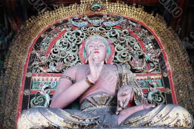 Ancient Buddha joss sculpture