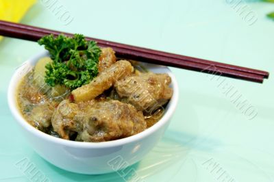 Chicken curry with chopstick