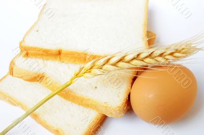 Bread, wheat ear and egg