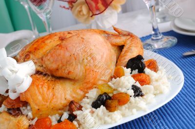 Grilled chicken with rice and dried fruits 