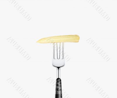 baby corn pierced by fork,  isolated on white background 