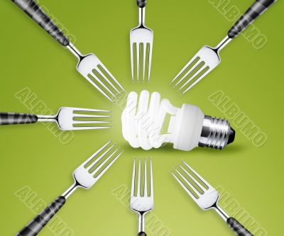 Forks around light bulb 